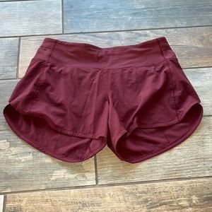Lululemon burgundy speed up shorts size 6 4’ mid rise
